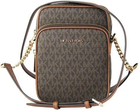 michael kors jet set travel medium flight crossbody bag|Michael Kors bag with airplanes.